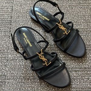 YSL Cassandra monogram flat sandals with sling back